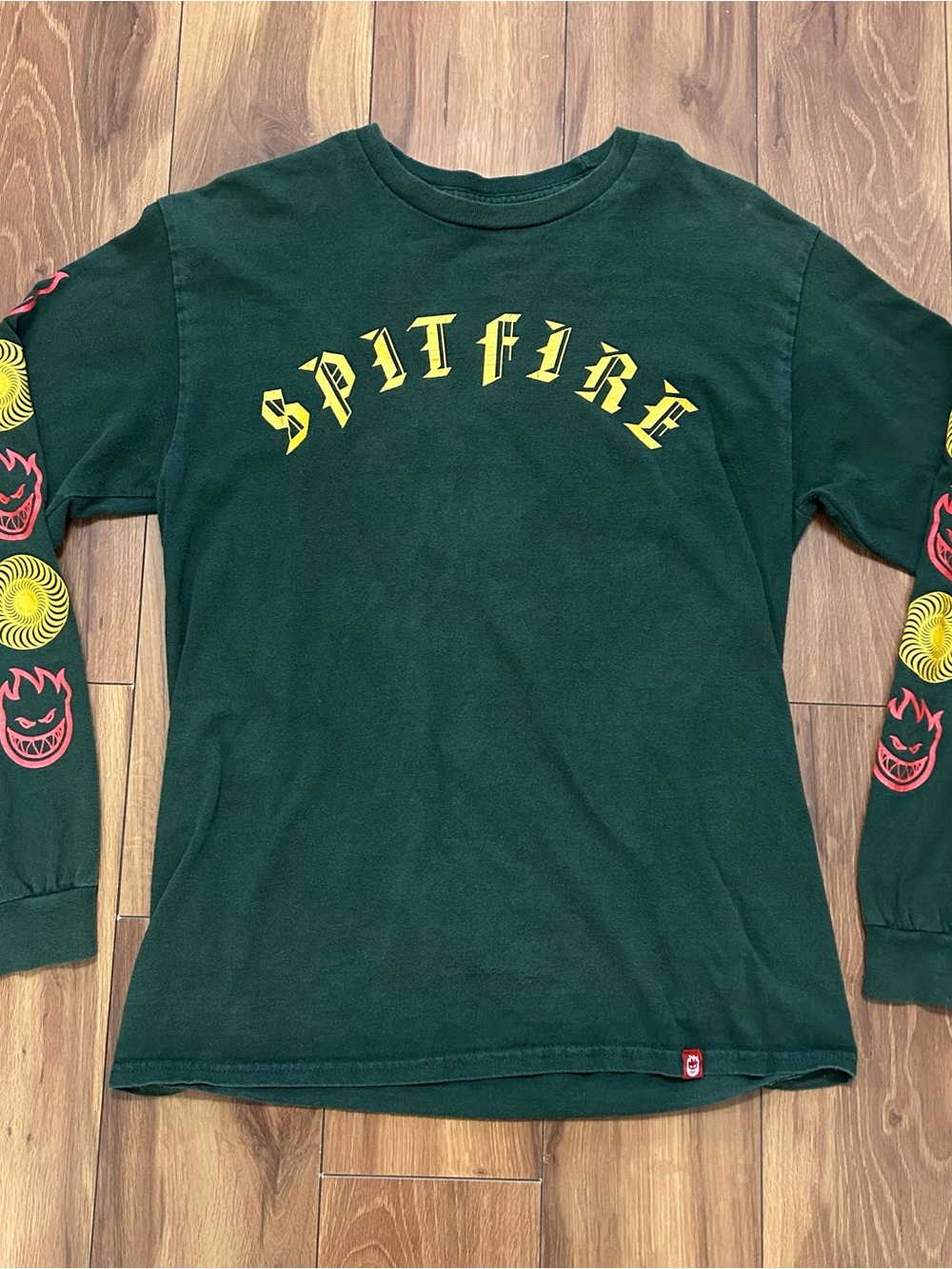 Spitfire Dark Green Long M Sleeve Tee with Yellow Logo and Red Sleeve Graphics